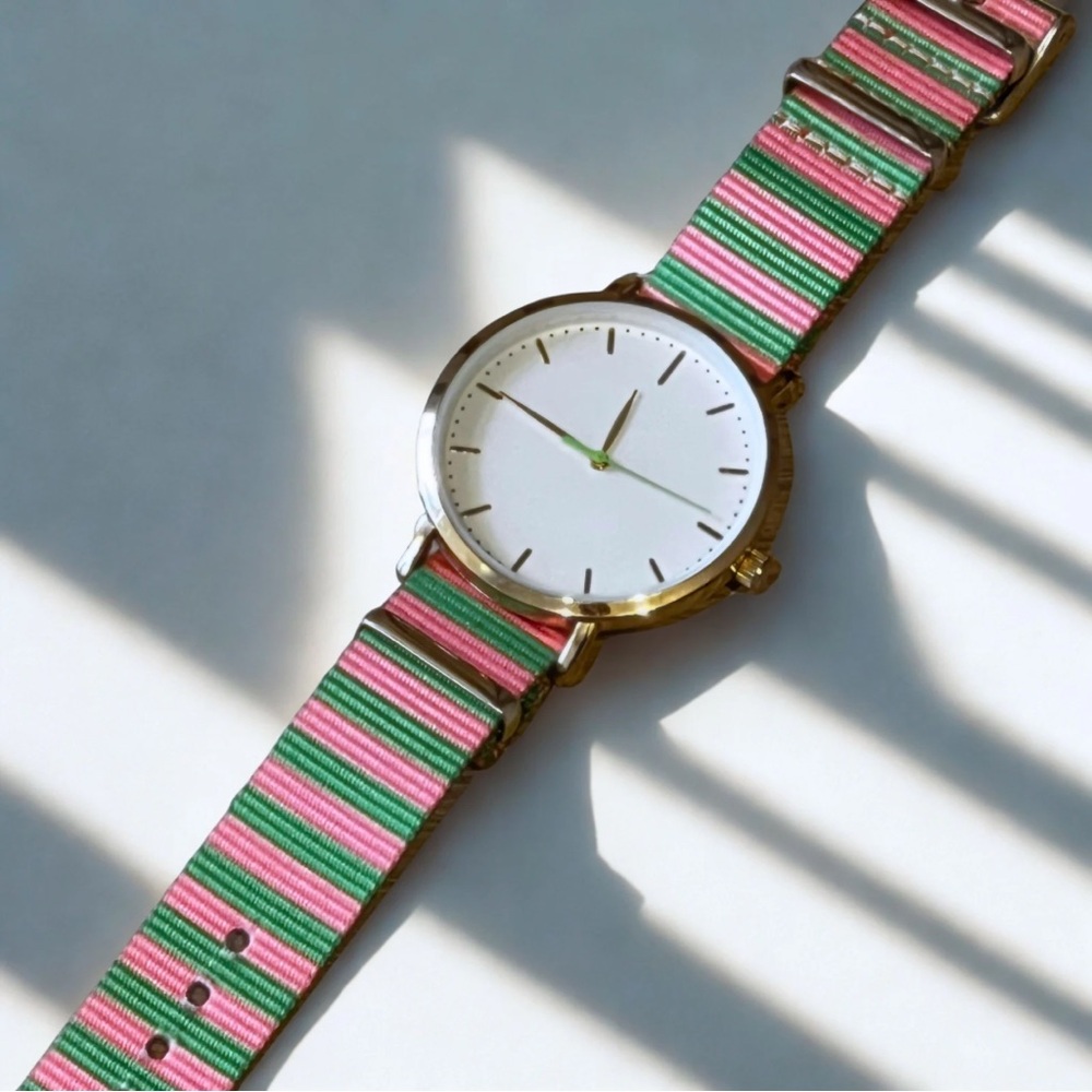 🕘 Striped Pink and Green Watch with Gold Accents